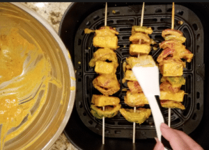 Brush marinade on paneer tikka