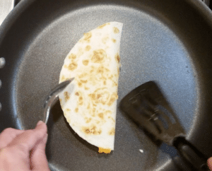 Fold chicken keto quesadilla